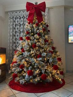 a decorated christmas tree in a living room