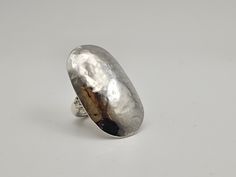 Vintage Modernist 925 Silver Hammered Knuckle Ring - Vintage 925 Solid Silver - Modernist Ring - Artisan Signed - 15 grams - Size 5.5 Welcome to Westgate Jewels!! We specialize in vintage estate, designer, and fine jewelry. Our shop consists of items that are estate, antique, and / or vintage conditions unless otherwise noted. This means that most items are prior owned and may have some imperfections such as light scratches, scuffs, and / or patina. Our items are cleaned and polished professiona Vintage Silver Hammered Rings, Silver Hammered Oval Ring, Silver Domed Ring Gift, Oval Silver Hammered Ring, Handmade Silver Dome Ring, Oval Silver Dome Ring Stamped 925, Handmade Oval Dome Ring In Sterling Silver, Handmade Adjustable Silver Dome Ring, Vintage Native American Jewelry