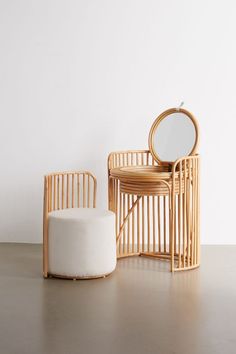 two chairs and a stool with a mirror on the top one is made out of bamboo