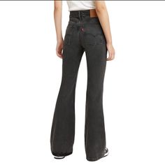 New With Tags, Ultra High Rise, Slim Through Hip And Thigh. Size 31x34, Tall Or Long Inseam. See Measurements Measurements Waist: 16” Flat Hips: 21.5” Flat Rise: 13” Inseam: 34” Keywords: Washed Black, Denim, Jeans, Flares, Bell Bottoms, High Waisted, Ultra High Rise, High Waist Retro Levi's Bottoms For Fall, Levi's Retro Wide Leg Bottoms, Fitted Retro Levi's Bottoms, Retro Levi's Wide Leg Bottoms, Retro Levi's Wide-leg Bottoms, Black Full-length Retro Jeans, Levi's Vintage Full-length Bottoms, Vintage Levi's Full-length Bottoms, Retro Levi's Bottoms