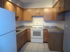 the kitchen is clean and ready for us to use in its new owner's house