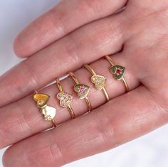 Our take on fine sweet little stacking rings. Layer them up and mix your metals! The Mini Heart Stacking Ring is star set with a pink sapphire - perfectly layered with the Little Groove Band or Tiny Dot Ring. Pink sapphire measures 1.5mm. Heart measures 7 x 6.5mm. Band width 1.5mm. Weight 1.5g approx. Pictured here with a high shine finish. For a matte finish please leave a note at checkout. Double Heart Ring, Dot Ring, Vs Diamond, Jewelry Lookbook, Double Heart, Mini Heart, Jewelry Inspo, Dream Jewelry, Pretty Jewellery