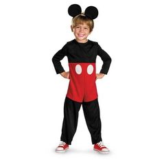 a young boy in mickey mouse costume