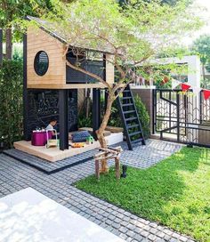 a small house with a tree in the yard