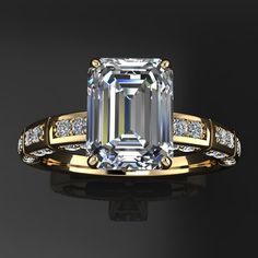 The Jada ring is an interesting engagement ring, it almost has a modern AND a vintage feel. Can you dig it? Featuring a near colorless emerald cut NEO moissanite, almost 2 carats of YUM, and surrounded by diamonds. You got diamonds left, right and top, baby! All stones are hand set into 14k white, rose, yellow gold, or platinum. The shank measures 2mm wide. Wedding band in picture is available, but sold separately. Check out the NEO emerald cut in action - https://www.instagram.com/p/BLTkAPzBO-j Halo 2, Emerald Cut Rings, Best Engagement Rings, White Diamond Ring, Moissanite Wedding Rings, Bracelet Design, Rose Yellow, Diamond Solitaire Engagement Ring, Dream Ring