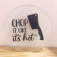 a glass plate that says, chop it like its hot