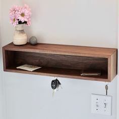 Our Floating Entryway Organizer is handmade from a single American Black Walnut plank, highlighting a continuous wrap-around grain.Available in 4 lengths, this floating shelf mounts quickly and easily with an integrated french-cleat. We embed 3 rare-earth magnets on the underside for keys. The shelf depth is perfect for sunglasses, wallets, phones and your mail.Golden-ratio proportions make for a pleasing and functional size. Each piece is hand-finished with VOC-Free Polymerized Linseed Oil for Floating Furniture, Decoration Hall, Entryway Modern, Entryway Shelf, Entryway Organizer, Entryway Mudroom, Small Entryways, Wall Shelves & Ledges, Modern Entryway