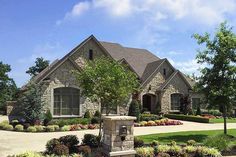 a large house with landscaping around it