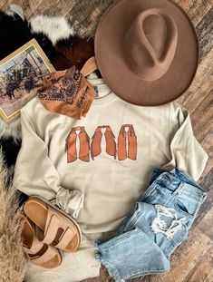 Chaps Sweatshirt (taupe) – theFRINGEDpineapple Brown Western Tops For Winter, Brown Western Style Top For Winter, Western Brown Tops For Winter, Western Style Brown Tops For Ranch, Country Style Crew Neck Top For Rodeo, Fall Ranch Crew Neck T-shirt, Country Style T-shirt For Rodeo In Fall, Western Crew Neck Tops For Rodeo, Beige Relaxed Fit T-shirt For Fall