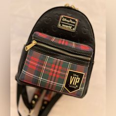 Disneyland Exclusive Vip Tours 2024 Loungefly Backpack - New With Tags! Beautiful Black With Iconic Vip Plaid. Gold Hardware & Exclusive Vip Interior With Headband Straps For Your Disney Ears. Item Is Brand New, Unused, New With Tags. Smoke/Pet Free. Exclusive Disneyland Vip Tours Merchandise Is Only Available To Those Doing A Tour. Not Available Online Or In Stores. *Photos Were Taken With A Phone & Colors May Vary Slightly In Person. No Refunds Or Returns. Loungefly Backpack, Disney Bags, Disney Bag, Plaid Vest, Disney Ears, Gold Hardware, Disneyland, Not Available, Bag Lady