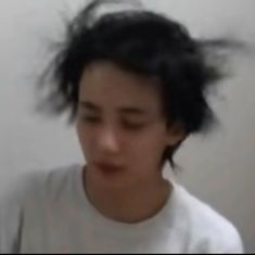 a blurry photo of a person with black hair