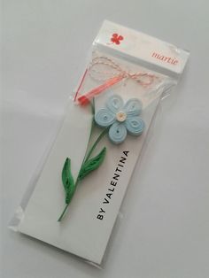 a package with some flowers inside of it