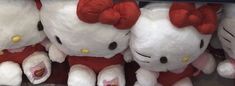 several hello kitty stuffed animals are on display