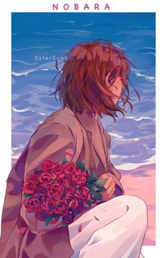 a woman sitting on top of a beach next to the ocean holding a bouquet of flowers