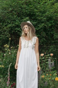 "Sweetest vintage 80's - 90's nightgown! Pale pink soft cotton with white lace and buttons at the chest. Condition: In great vintage condition. Light average wear - no issues to note! Measurements: Seems to best fit a size small - medium Bust: 36\" Waist: 48\" Hips: 48\" Overall Length: 45\" For reference, model is 5'9\"and measures 33/29/39 All measurements are taken flat and then doubled when appropriate. Please let us know if you have any questions about sizing or fit. Please check out the sh Summer Nightgown With Lace Trim, Summer Sleeveless Nightgown With Delicate Lace, Summer Sleeveless Delicate Lace Nightgown, Sleeveless Delicate Lace Summer Nightgown, Summer Beach Nightgown With Lace Trim, Cottagecore White Nightgown With Lace Trim, White Cottagecore Dress For Sleep, Summer Nightgown With Delicate Lace For Bedtime, White Lace Trim Nightgown For Spring