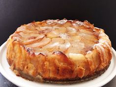 a cake on a white plate sitting on a table