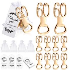 gold wedding favors and bottle openers with thank you tags in the middle, set of 6