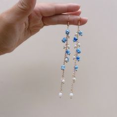 More on our lily of the valley earrings section:  https://www.etsy.com/shop/floralfenzy?ref=shop_sugg_market&section_id=42804670 🌸 Introducing our stunning botanical-style earrings, featuring intricate designs of delicate Lily of the Valley flowers. Each flower petal is meticulously crafted to showcase the intricate details of this beautiful flower. 🌸 Handcrafted with exceptional attention to detail, these earrings are a true work of art. The light blue color of the design adds a touch of spring to any outfit, while the simple dangles allow the botanical design to be the star of the show. 🌸 These earrings are versatile and easy to style, making them a perfect addition to any jewelry collection. Whether you're dressing up a casual outfit or adding the finishing touch to a formal dress, t Feminine Earrings, Lily Of The Valley Flowers, Valley Flowers, Flower Petal, Cute Flower, Handmade Jewelry Diy, Themed Jewelry, Amber Jewelry, Get Well Soon