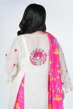 White tunic with panels and floral thread embroidery. Comes with salwar, dupatta and inner.
Components: 4
Pattern: Embroidered
Type Of Work: Thread,Pearl
Neckline: Round
Sleeve Type: Three quarter
Fabric: Mul chanderi fabric
Color: White
Other Details: 
Length:
Tunic: 40 inch
Salwar: 37 inch
 Dupatta (LxW):20 inchx2.10 mtr
Model Height: 5 ft 3 Inches wearing size 10
Occasion: Mehendi and Haldi - Aza Fashions Floral Thread Embroidery, Types Of Work, White Tunic, Thread Embroidery, Set For Women, Aza Fashion, Model Height, Sleeve Type, Three Quarter