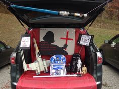 star wars memorabilia in the trunk of a car