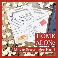 the movie scavenger hunt with popcorn and movies on it, next to a remote control