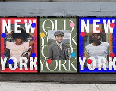 three posters on the side of a building advertising new york