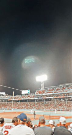 a baseball stadium filled with lots of people