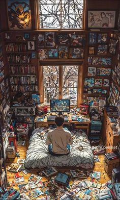 a person sitting on top of a bed in a room filled with books and magazines