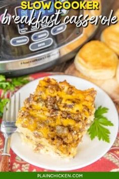 a slice of slow cooker breakfast casserole on a plate next to the crock pot