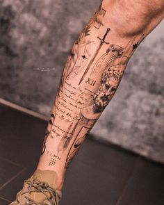 a man's leg with a cross on it and words written all over it