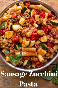 sausage zucchini pasta in a bowl with basil