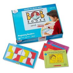 three books and two games for children to play with