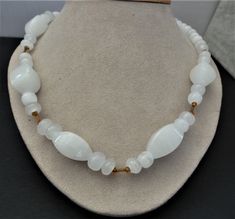 Stunning white  moonstone Quartz necklace It is about 24" long. It does not have a clasp. You slip it over your head There is 5 large beads about 1 1/4" L x 2 1/2" around smaller beads are about 1 1/4" around There is amber color seed and bugle bead spacers in the design.   If you have any questions, please convo me before purchase  I will be more than happy to help All sales are final. This shop does not offer refunds This shop ships only in USA please convo for exceptions              Thanks f Very Nice Pic, Large Beads, White Moonstone, Bugle Beads, Moonstone Necklace, Amber Color, Necklace Vintage, Quartz Necklace, Vintage Necklace