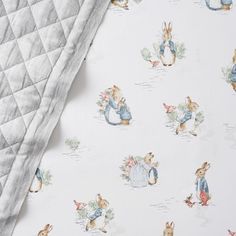 Peter Rabbit is up to some garden mischief! Featuring enchanting illustrations from the classic tale by Beatrix Potter(TM), our bedding set adds storybook charm to the nursery. DETAILS THAT MATTER Quilt Quilt is expertly stitched by hand. Quilt reverses to same. Quilt is filled with 100% polyester. Crib Fitted Sheet Crib fitted sheet is made of 100% organic cotton percale. Percale weave is a tightly woven weave, which gives the fabric a soft matte finish while providing durability and wears well Elephant Baby Bedding, Crib Liners, Crib Fitted Sheet, Pb Kids, Swaddle Sets