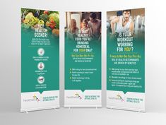 two roll - up banners with an image of people in the background