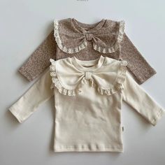 Cute Beige Winter Tops, Cute Cotton Fall Blouse, Sweet Long Sleeve Blouse For Spring, Cotton Blouse With Cute Collar For Fall, Fall Cotton Blouse With Cute Collar, Sweet Tops With Ruffles And Doll Collar, Sweet Long Sleeve Ruffled Tops, Sweet Long Sleeve Tops With Ruffles, Sweet Doll Collar Top With Ruffles