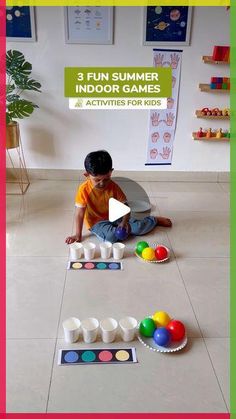 a little boy sitting on the floor playing with some sort of toys in front of him