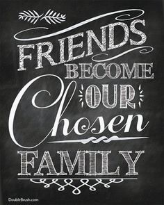 a chalkboard sign with the words friends become our chosen family written in white ink