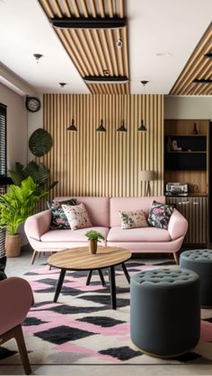 a living room with couches, chairs and tables in front of wooden paneled walls