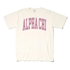 a white t - shirt with the word,'alpha phi'in pink on it