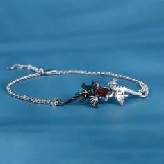 Can you believe it? This dragon couple's relationship is one of the strongest romance relationship in the fictional world. Crafted in sterling silver, this bracelet in Hug Me® collection shows a loving dragon couple hugged a heart-cut stone together. As a great Valentine and Christmas gift, the meaningful bracelet celebrates your everlasting love. You will find more adorable and creative designs in our Hug Me® collection.Carat Weight: 1.4 ctStone Size: 6*6 mmNumber of Stones: 1 Stone Shape: Hear Sterling Silver Jubilee Bracelet For Promise, Silver Sterling Silver Bracelets For Promise, Sterling Silver White Gold Bracelet For Promise, Sterling Silver White Gold Promise Bracelet, Sterling Silver Jubilee Bracelet For Valentine's Day, Symbolic Sterling Silver Bracelets As Gift, Valentine's Day Engraved Sterling Silver Bracelets, Sterling Silver Bangle For Valentine's Day, Dragon Couple