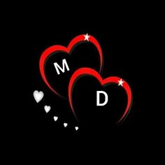 two hearts with the letter m and d on them, surrounded by small white hearts