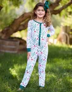 Let your kids join in on the festive fun with the Andes Kids Onesie - a holiday-themed loungewear onesie. Bring the whole family together with a matching Mom's Andes Onesie for a perfect bit of holiday cheer. 
   
 
 Snap button closure  
 
   
 Model Measurements : 
 
 Reese is wearing a size M 
 Height: 4'0 
 Bust: 22 1/2 inches  
 Waist: 20 1/2 inches 
 Hips: 25 1/2 inches Casual Christmas Loungewear Onesie, Christmas In The City, Beach Bunny Swimwear, Hawaii Surf, Family Together, Matching Mom, Beach Bunny, Cover Up Dress, Swim Top