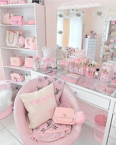 a room filled with lots of pink items and accessories on shelves next to a mirror