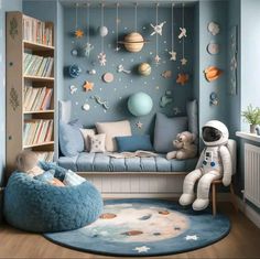 a child's room decorated in blue and white with stars on the ceiling, bookshelves and stuffed animals