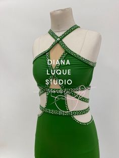 a green dress with white lettering on it