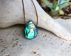 Abalone Shell Cord Necklace Bohemian Iridescent Necklace As A Gift, Iridescent Bohemian Necklace As Gift, Bohemian Iridescent Necklace For Gift, Iridescent Necklaces With Natural Stones For Healing, Iridescent Pendant Necklace With Natural Stones, Silk Cord Necklace, Abalone Jewelry, Floating Necklace, The Pacific Ocean