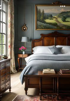 a bedroom with a large painting on the wall next to a bed and nightstands