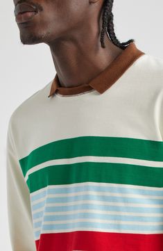 Bold stripes and a mock neck underscore the vintage sportswear inspiration behind this rugby T-shirt knit from dense cotton jersey and finished with a step hem. Spread collar Long sleeves with ribbed cuffs 100% cotton Machine wash, dry flat Made in Portugal Designer Clothing Vintage Sportswear, Bold Stripes, Green And Blue, White Green, The Vintage, Drake, Rugby, Mock Neck, Designer Clothing