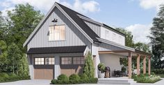 a two story house with an attached garage and covered porch, surrounded by greenery